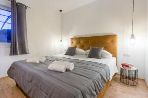 Posteľ alebo postele v izbe v ubytovaní Villa San + 19 fotografií