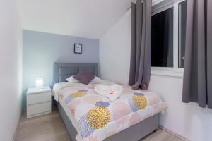 Posteľ alebo postele v izbe v ubytovaní Villa San