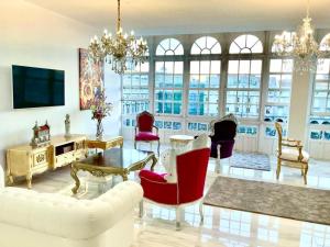 TV a/nebo společenská místnost v ubytování Apartamento María Pita + 18 fotografií