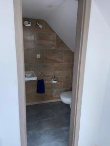 Ein Badezimmer in der Unterkunft Casa Andrea 4 Zimmer Wohnung