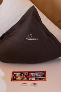 Postel nebo postele na pokoji v ubytování Hotel Garni Lawens