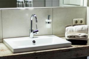 Koupelna v ubytování Hotel Garni Lawens