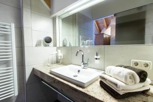 Koupelna v ubytování Hotel Garni Lawens + 37 fotografií