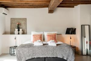 Postel nebo postele na pokoji v ubytování Bossche Suites No2 - Verwersstraat