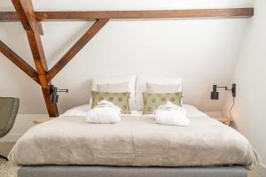 Postel nebo postele na pokoji v ubytování Bossche Suites No2 - Verwersstraat