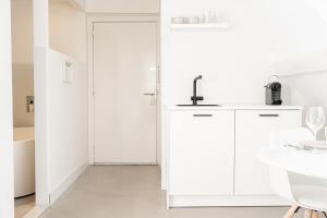 Kuchyň nebo kuchyňský kout v ubytování Bossche Suites No2 - Verwersstraat