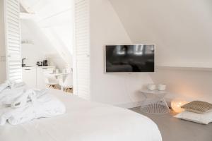 Postel nebo postele na pokoji v ubytování Bossche Suites No2 - Verwersstraat