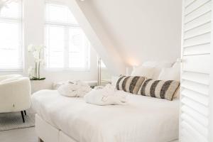 Postel nebo postele na pokoji v ubytování Bossche Suites No2 - Verwersstraat