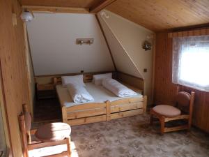 Posteľ alebo postele v izbe v ubytovaní Hotel Lesní dům + 37 fotografií
