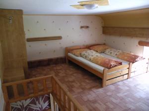 Posteľ alebo postele v izbe v ubytovaní Hotel Lesní dům
