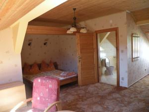 Posteľ alebo postele v izbe v ubytovaní Hotel Lesní dům