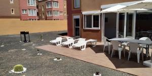 A patio or other outdoor area at La flor del Atlantico