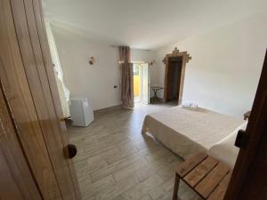 Postel nebo postele na pokoji v ubytování La Casa di Michele
