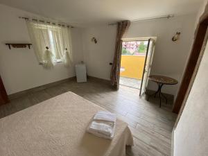 Postel nebo postele na pokoji v ubytování La Casa di Michele