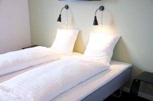 Postel nebo postele na pokoji v ubytování Motel X