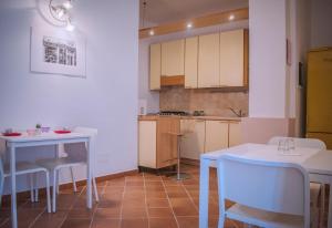 Kuchyň nebo kuchyňský kout v ubytování B&B Quattro Lune