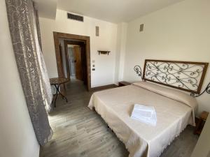 Postel nebo postele na pokoji v ubytování La Casa di Michele