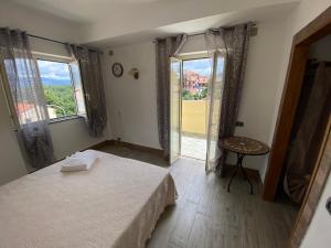 Postel nebo postele na pokoji v ubytování La Casa di Michele