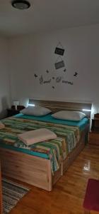 Posteľ alebo postele v izbe v ubytovaní Apartment Nereo