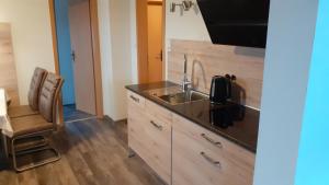 Kuchyň nebo kuchyňský kout v ubytování 80qm Top Wohnung für 4 Personen in 2 Schlafzimmer