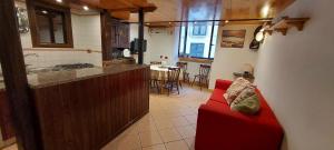 A kitchen or kitchenette at Casa Enea