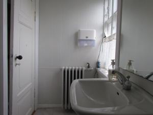 Koupelna v ubytování Cosy Guesthouse anno 1936