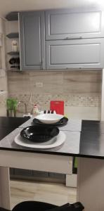 Kuchyň nebo kuchyňský kout v ubytování Teo Apartment + 5 fotografií