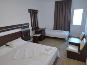 Postel nebo postele na pokoji v ubytování Casa Rustica