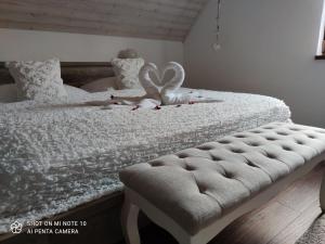 Postel nebo postele na pokoji v ubytování MJ Vila