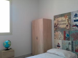 Ένα ή περισσότερα κρεβάτια σε δωμάτιο στο Apartment 1st floor in Villino Eliana