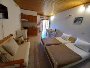 Kuchyň nebo kuchyňský kout v ubytování Marketos Apartments