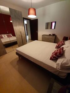 Posteľ alebo postele v izbe v ubytovaní Il Bonsai Brucoli Villetta per turisti