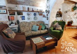 Posezení v ubytování La grotta di NiMa