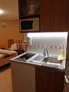 Kuchyňa alebo kuchynka v ubytovaní Molnár Apartment