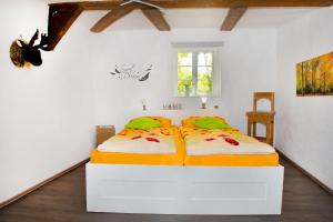 Ein Bett oder Betten in einem Zimmer der Unterkunft Ferienwohnung Goslar Runenhaus