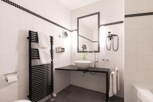 Koupelna v ubytování Hotel am Torturm