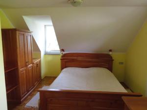 מיטה או מיטות בחדר ב-Country House Apat