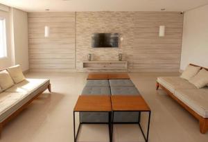 Χώρος καθιστικού στο Loft encantador e refinado