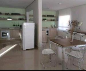 Η κουζίνα ή μικρή κουζίνα στο Loft encantador e refinado