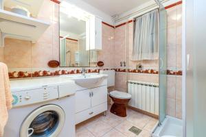 Koupelna v ubytování Apartments Slavko