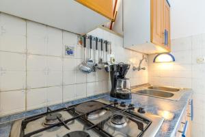 Kuchyň nebo kuchyňský kout v ubytování Apartments Slavko