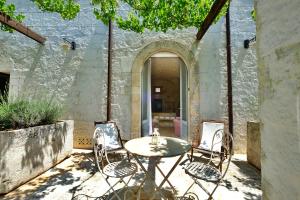 Patio nebo venkovní prostory v ubytování Masseria Trulli e Vigne