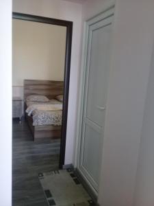 Postel nebo postele na pokoji v ubytování Apartment Giorgi in Sighnaghi