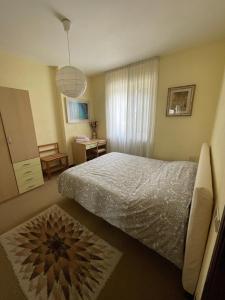 A bed or beds in a room at Casa Dolce Casa