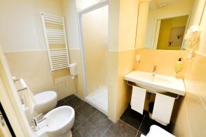 Koupelna v ubytování Hotel Iris