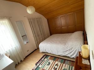 A bed or beds in a room at Casa Dolce Casa