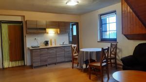 Kuchyň nebo kuchyňský kout v ubytování Budha Apartmá