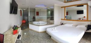 TV a/nebo společenská místnost v ubytování Motel Colorado (Adult Only)
