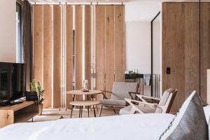 Televiisor ja/või meelelahutuskeskus majutusasutuses zelloon boutique hotel