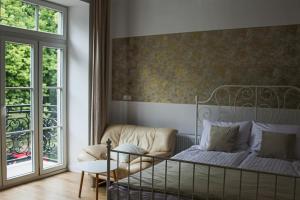 Postel nebo postele na pokoji v ubytování APARTAMENTY PRZY PARKU- Parking GRATIS!!!